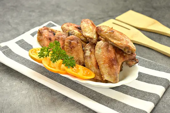 Куриные крылышки в апельсиновом маринаде в духовке