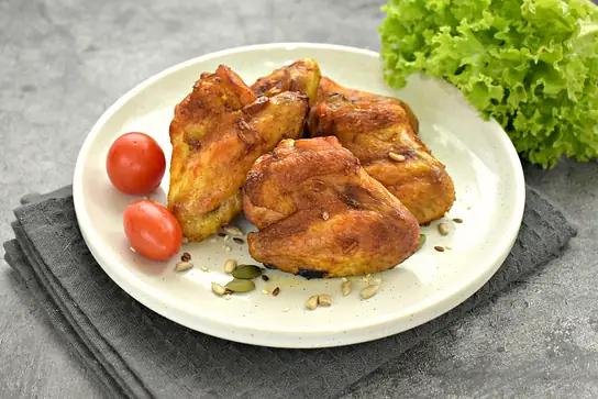 Куриные крылышки в чесночно-соевом маринаде в духовке